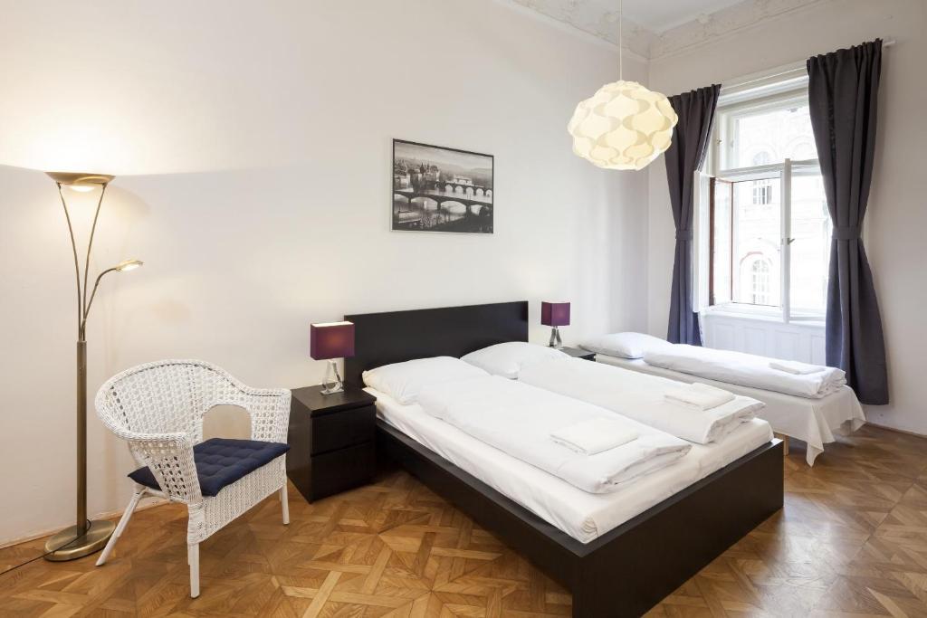 Capital Apartments Praga Habitación foto
